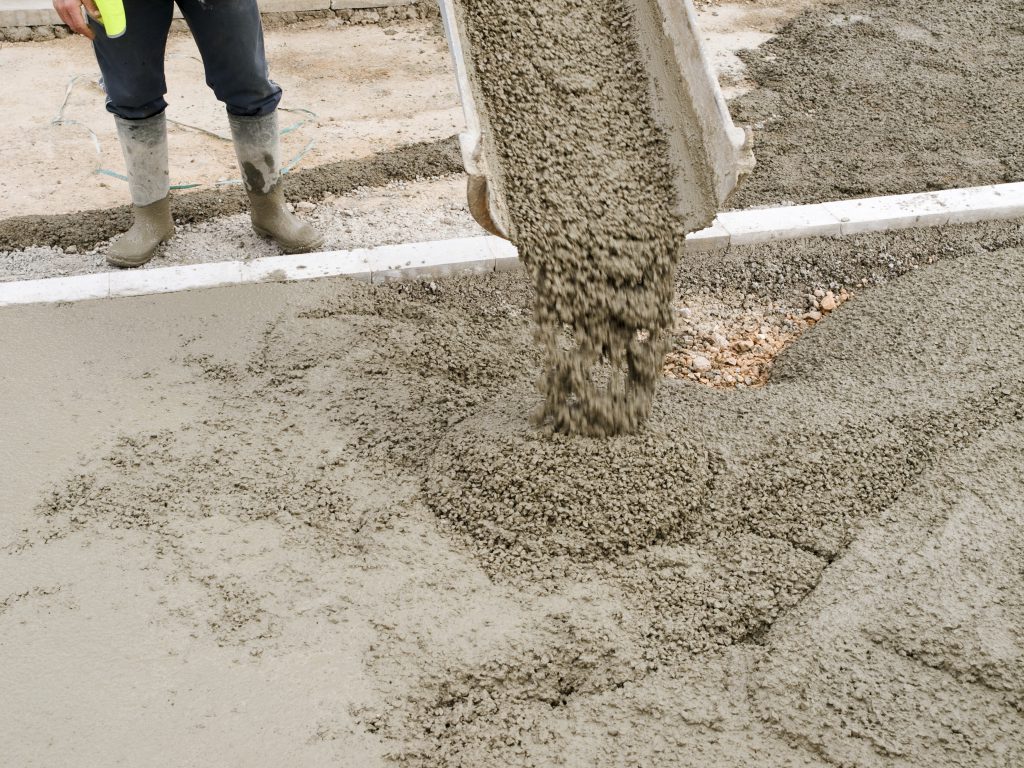 close up of concrete being poured on site